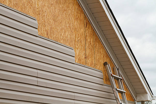 Professional Emergency Siding Repair technician working in Stokes, NC
